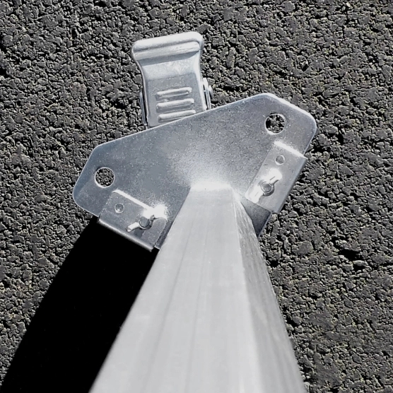 Vue de dessus de la roulette avec frein pour pied de barnum pliant