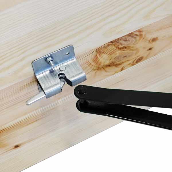 loquet de sécurité pour bloquer le pied rabattable